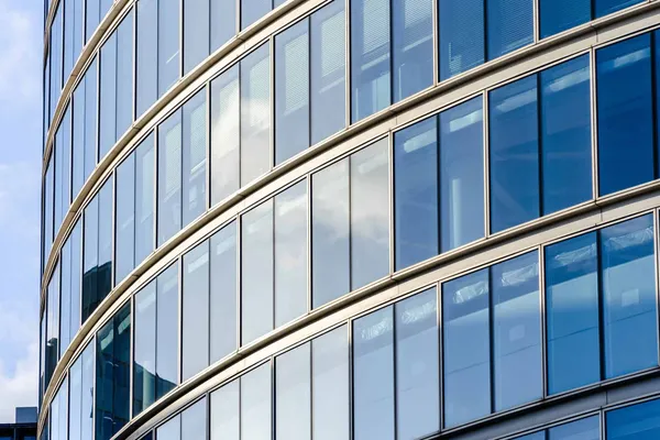 Curved glass facade of a city office building